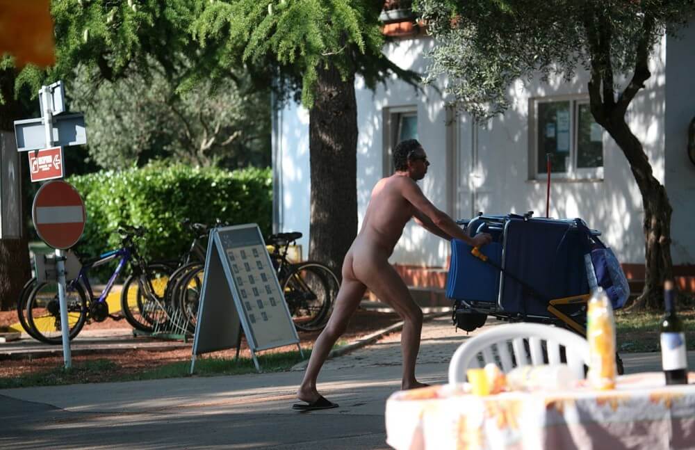 Park Side Street Pass-Bys photos - People come together in unity with nature to take off their clothes
