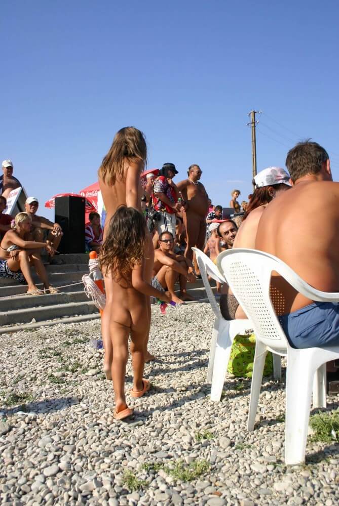 Naturist Standing Sideline - Naturalness requires openness