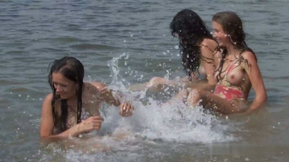 Body Art At Nudist Beach - Nudists live together in nature and in groups