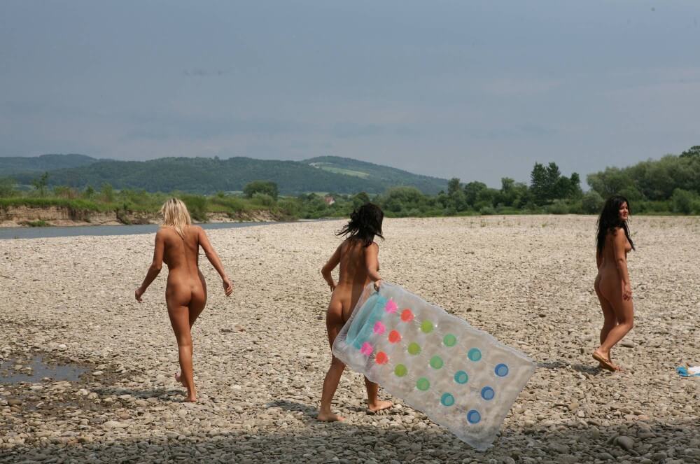 Naturist Park Floating On River photos - Nudity is seen as a natural and beautiful aspect of life