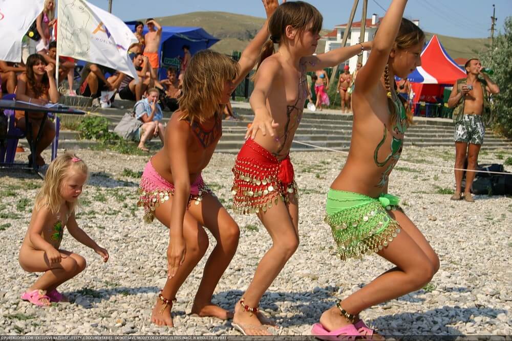 Festival and dancing photos - People come together in unity with nature to take off their clothes