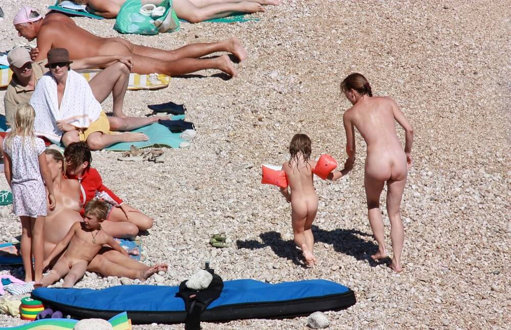 Orange Floaty Safety First Naturist pics - Naturism as a Way of Life