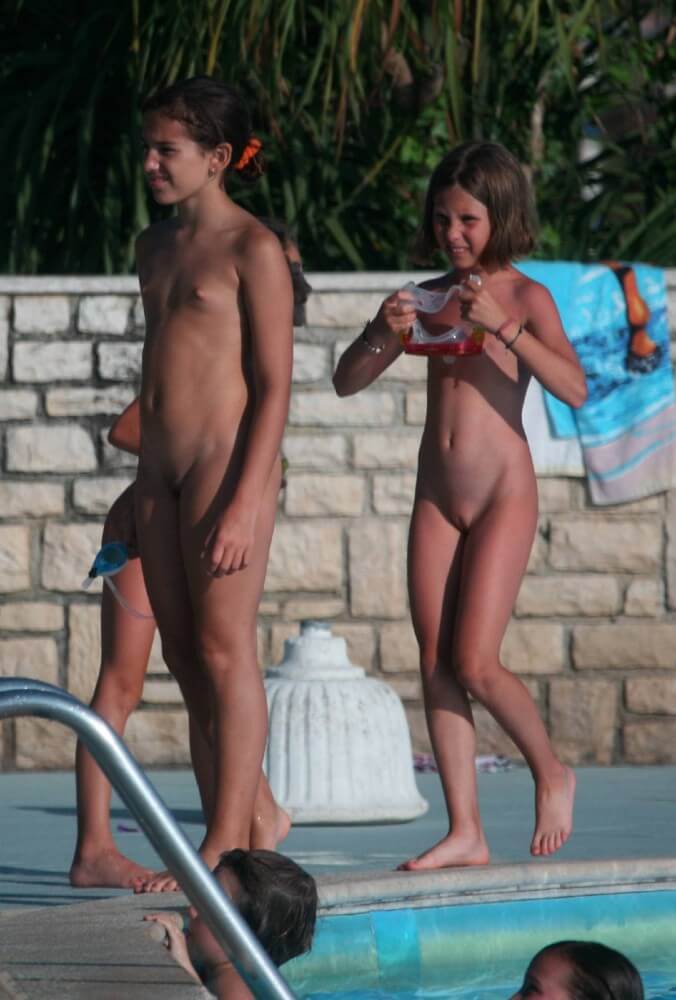 Two Poolside Nudist Girls pics - Living in harmony with nature is a defining characteristic of the naturist and nudist community