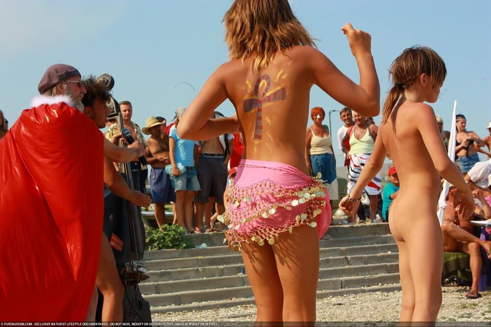 Colorful Carnival Dancing photos - The natural beauty of the body is one of the goals of naturism and nudism